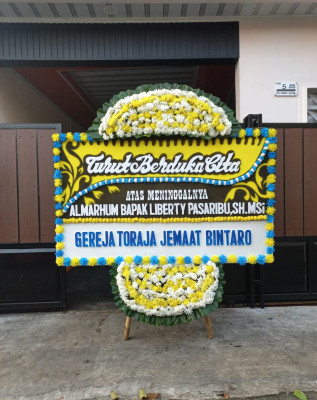 Papan Bunga Duka di Bido